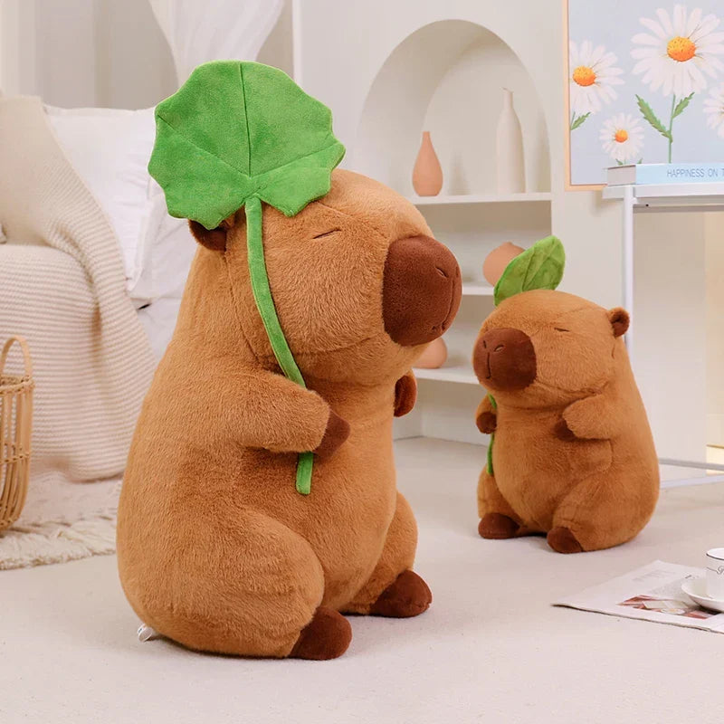 Adorable Kawaii Capybara Plushie Cuddling a Leaf