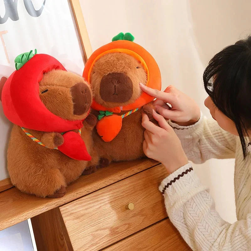Adorable Capybara Plushie Dressed in Whimsical Vegetable Hats