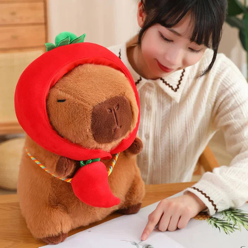 Adorable Capybara Plushie Dressed in Whimsical Vegetable Hats