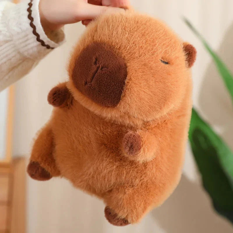 Adorable Capybara Plushie Dressed in Whimsical Vegetable Hats