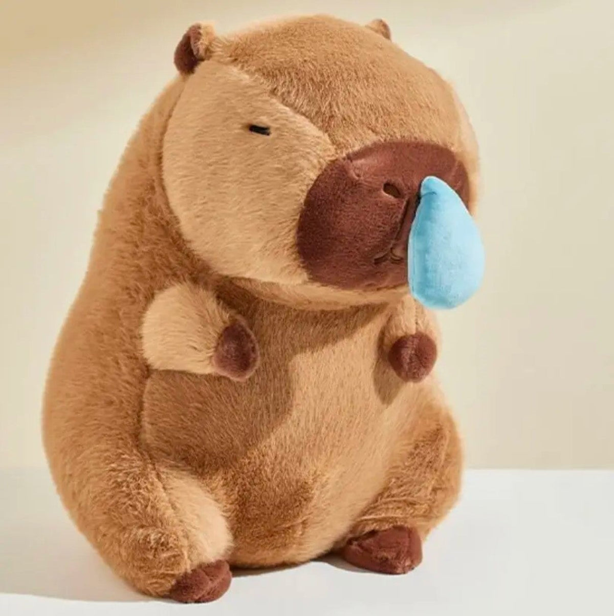 Adorable Capybara Plushie with a Playful Runny Nose