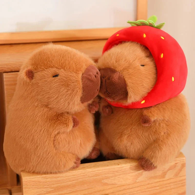 Adorable Capybara Plushie Adorned with a Cute Strawberry Hat