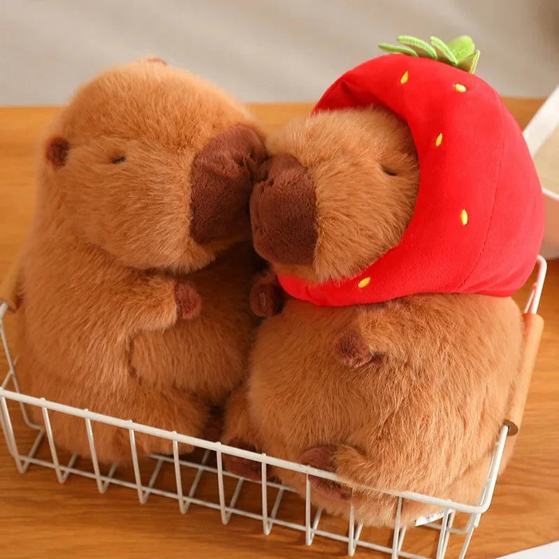 Adorable Capybara Plushie Adorned with a Cute Strawberry Hat