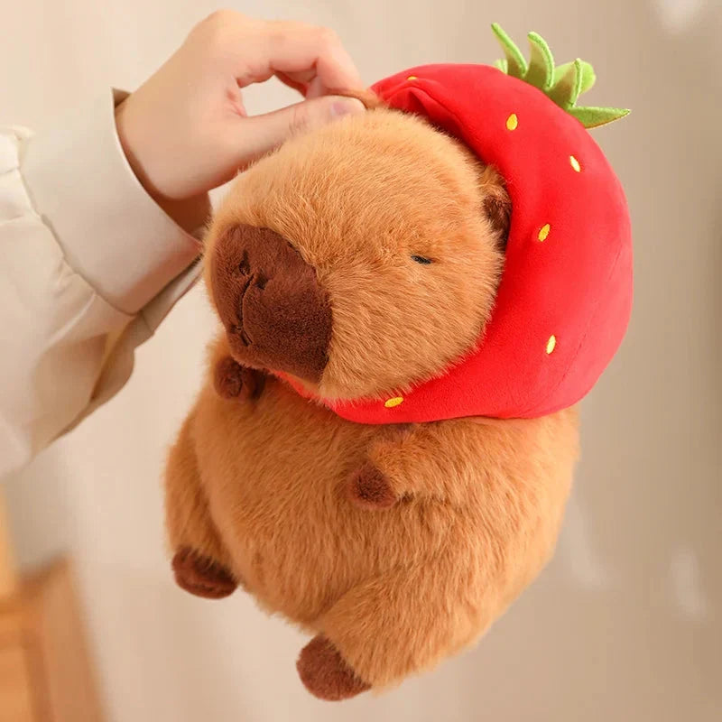 Adorable Capybara Plushie Adorned with a Cute Strawberry Hat