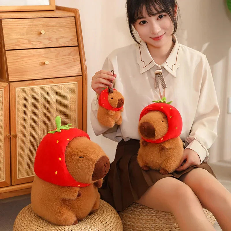 Adorable Capybara Plushie Adorned with a Cute Strawberry Hat