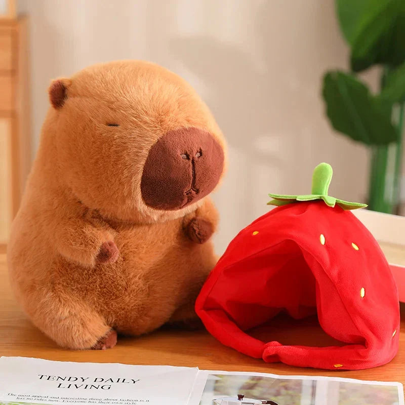 Adorable Capybara Plushie Adorned with a Cute Strawberry Hat