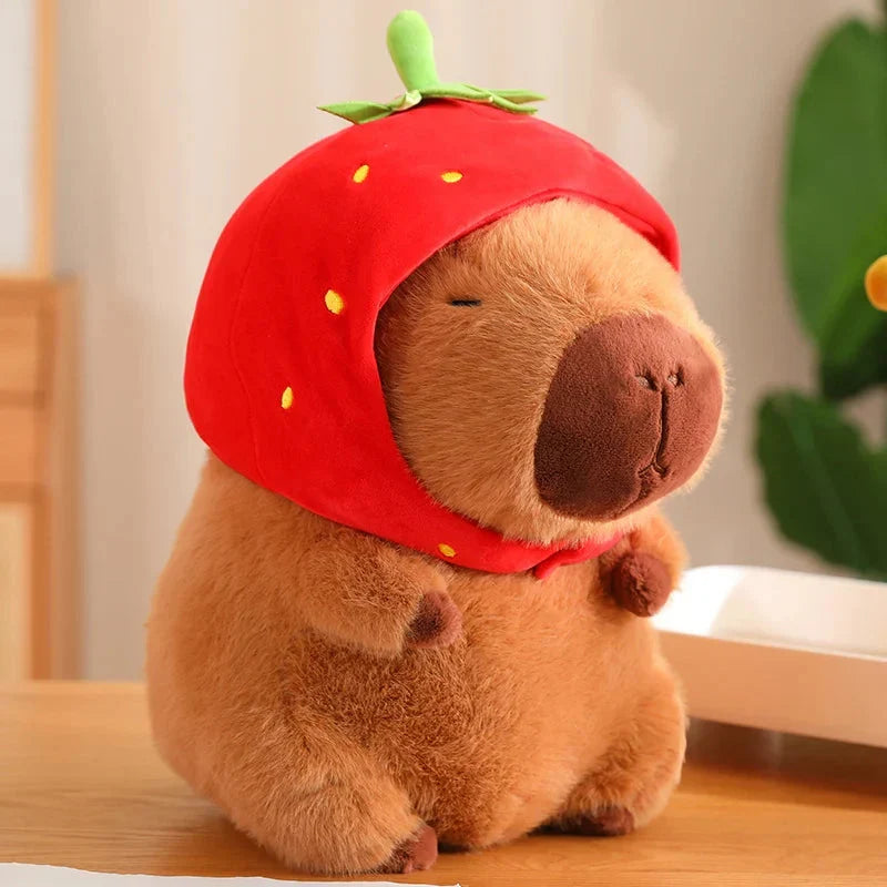Adorable Capybara Plushie Adorned with a Cute Strawberry Hat