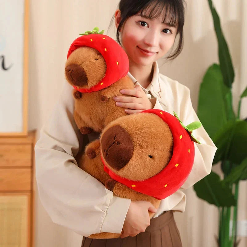 Adorable Capybara Plushie Adorned with a Cute Strawberry Hat