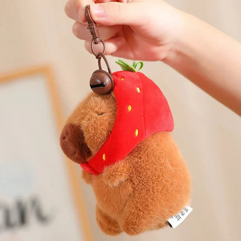 Adorable Capybara Plushie Adorned with a Cute Strawberry Hat